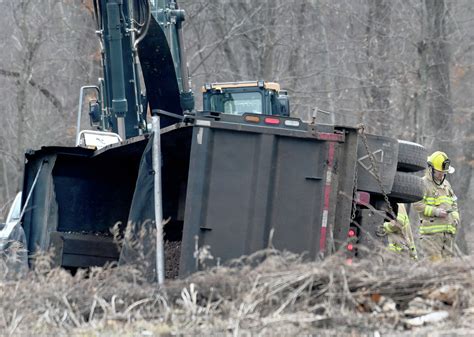 South Windsor dump truck crash causes fuel spill