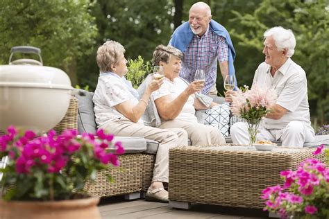 https://www.inhomecare.com/wp-content/uploads/2019/10/two-senior-couples-having-a-social-gathering-AS8YNJG.jpg