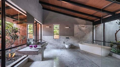 Weekend Villa in Alibaug fits snugly within its lush landscape ...