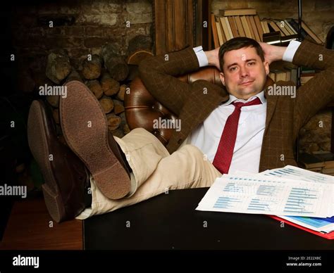 Office man feet table hi-res stock photography and images - Alamy