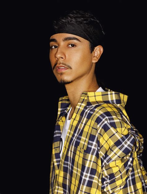 Download Stylish Manin Yellow Plaid Shirt Wallpaper | Wallpapers.com