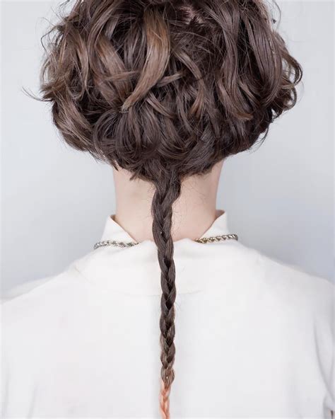 woman with short hair and long braided rattail | Rat tail haircut, Tail ...