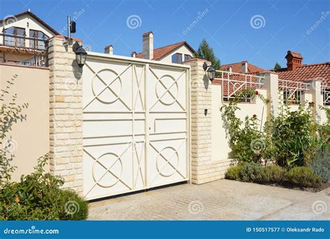 Luxury House Fence with Car Garage Gate Stock Image - Image of street, luxury: 150517577
