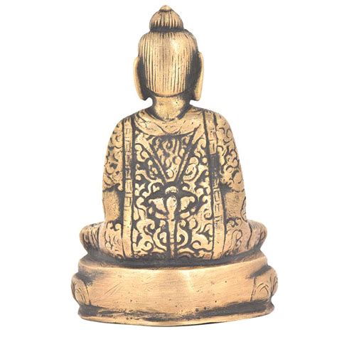 Bronze Buddha Sitting On A Raised Platform