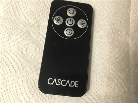 Image result for Cascade Tower Fan Remote Control Storage