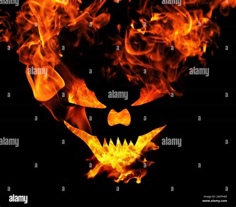 Burning scary halloween face, evil laughing devil face with flames ...