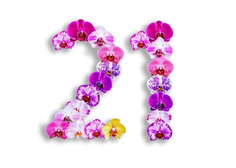 The shape of the number 21 is made of various kinds of orchid flowers ...