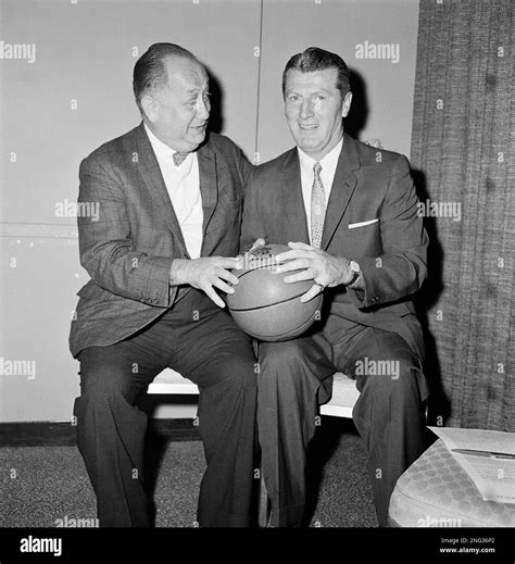 Frank McGuire, right, former University of North Carolina basketball ...
