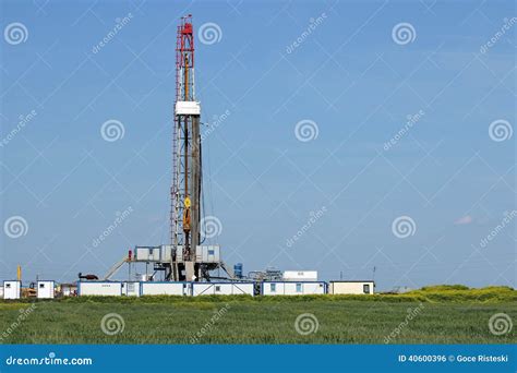 Land Oil Drilling Rig on Green Field Stock Photo - Image of tubing ...