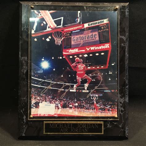 MICHAEL JORDAN AUTOGRAPHED "AIR JORDAN" PLAQUE WITH PICTURE, WITH ...