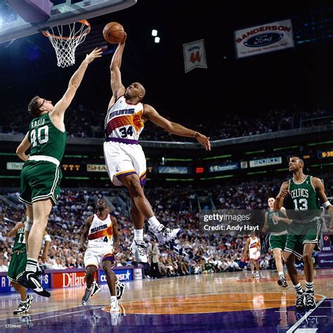 Charles Barkley of the Phoenix Suns goes for a dunk during the 1996 ...