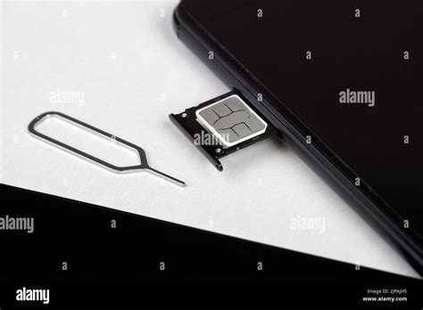 Image result for Open Sim Card Tray without Key