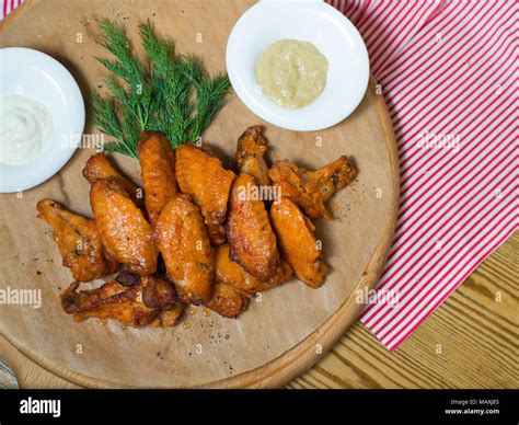 Grilled chicken wings on a tree dill Stock Photo Alamy