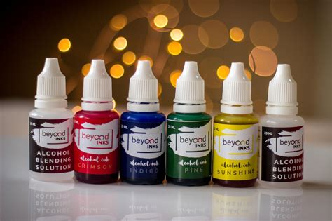 Alcohol Ink Starter Kit - 4 Inks, 2 Blending Solutions and 5 sheets YU ...