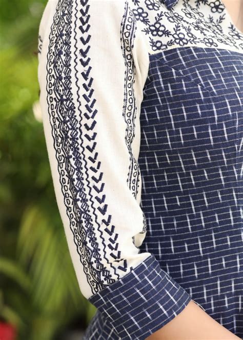 Stylish Navy Blue A-Line Ikat Dress with Embroidered Details – Sujatra