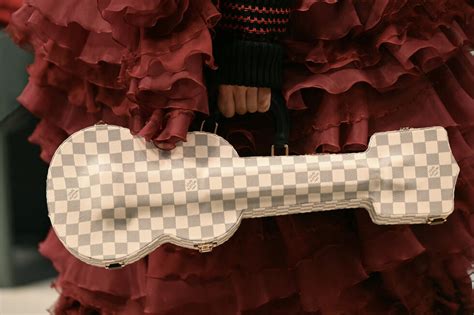 Stars hop aboard for train-inspired Louis Vuitton show