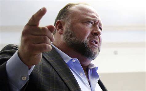 Conspiracy theorist Alex Jones goes on trial again over false Sandy ...