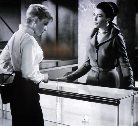 Elizabeth Allen shows Marsha (Anne Francis) the gold thimble. "The ...