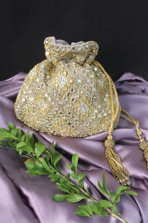 ROYAL ABLA HAND EMBROIDERED POTLI – White Maison de Couture