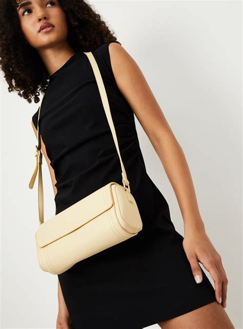 Buy Women Solid Sling Bag Online at just Rs. 999.0 - 1000015170005 ...