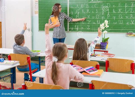Teacher and Students in the Classroom: Teaching Stock Photo - Image of ...