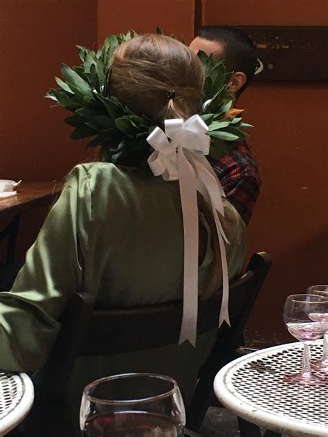 What do these wreaths mean? Have seen people wearing them all over Italy… : r/ItalyTravel