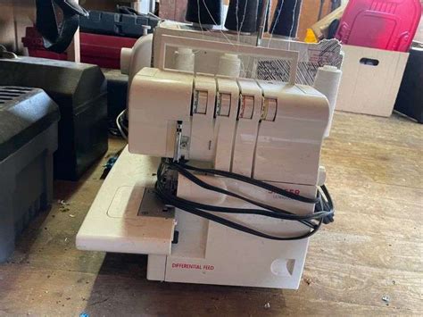 Image result for How to Thread Singer Ultralock