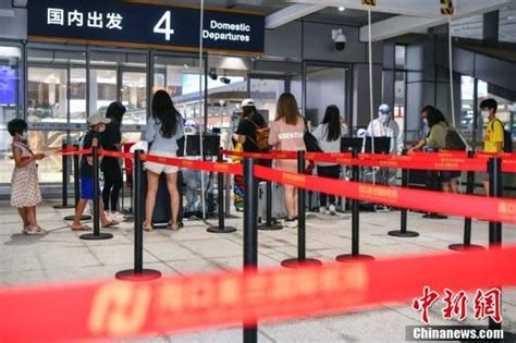 海南组织游客返程 首批660名滞留海口游客乘机离岛-搜狐大视野-搜狐新闻