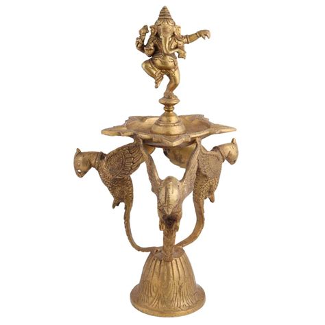 Brass Diya Dancing Ganesha On Three Peacock Stand
