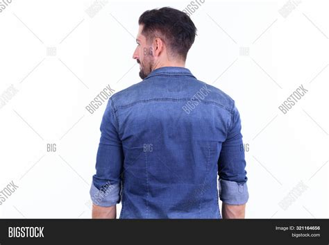 Man Looking Over Shoulder