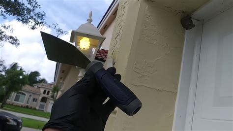 Mud dauber wasp nest removal with a simple bent pole scraper from Lowes ...