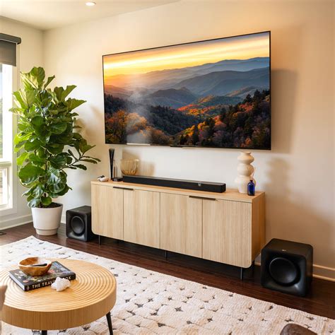 https://klipsch.imgix.net/product-images/Klipsch_Flexus-Core-200-SUB-100-modern-home-nature-on-tv_2000x2000.png?crop=focalpoint&domain=klipsch.imgix.net&fit=crop&fm=webp&fp-x=0.5&fp-y=0.5&h=1400&ixlib=php-3.3.1&q=100&w=1400