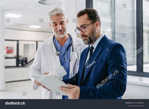 Pharmaceutical Sales Representative Talking Doctor Medical Stock Photo 2415868261 | Shutterstock