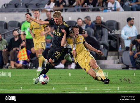 LAFC midfielder Mateusz Bogusz (19) and Real Salt Lake midfielder ...
