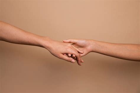 Two hands reaching Images - Free Download on Freepik