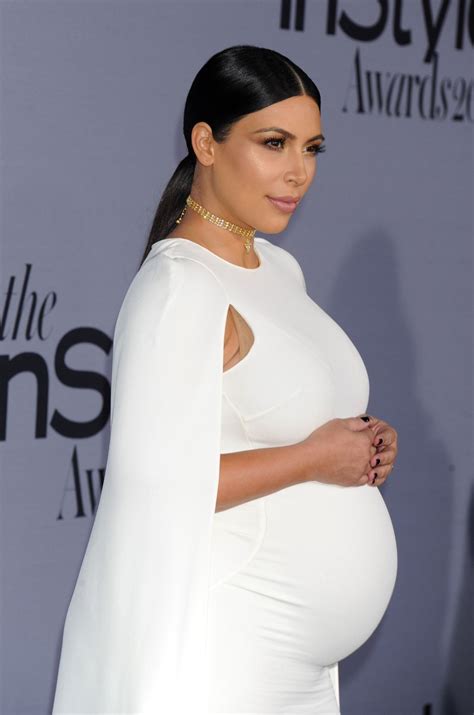 Pregnant Kim Kardashian Shows Off Her Ample Assets And 8AA