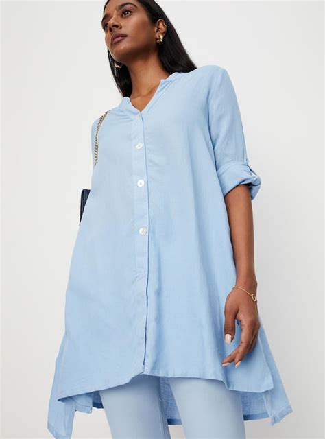 Buy Women Solid Mandarin Collar Tunic Online at just Rs. 899.0 ...