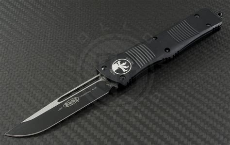Microtech Knives Troodon S/E Automatic OTF D/A Knife (3.1in Black Plain ELMAX) 139-1T-ELMAX ...