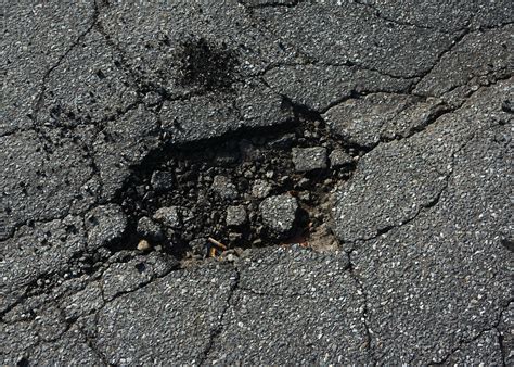 3 Types of Asphalt Driveway Repair Methods — Boots On Enterprises