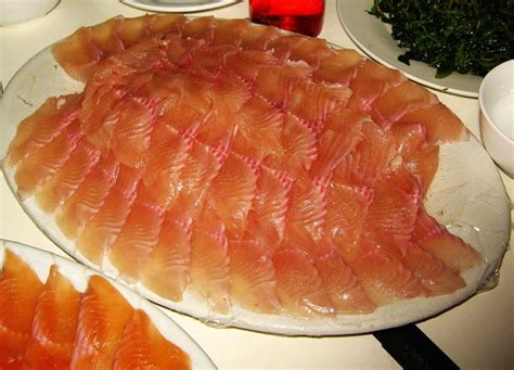 壮族传统美食——鱼生、活血、熏肉等 - 民族美食 - 广西民族文化与旅游发展网