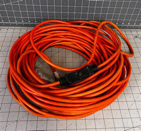 100 Foot Extension Cord Orange | EstateSales.org
