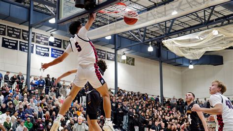 East Lansing boys basketball edges Waverly in top-10 showdown