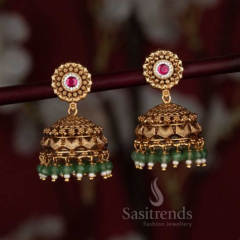 Temple Matte Gold Jhumka Earrings with AD Stone Studs - Sasitrends