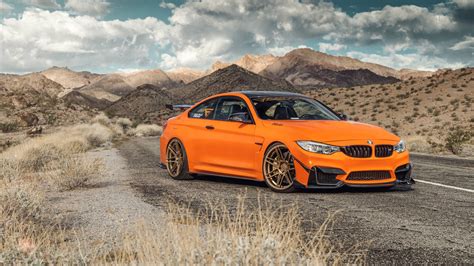 Download Orange Full HD BMW 2019 M4 Wallpaper | Wallpapers.com