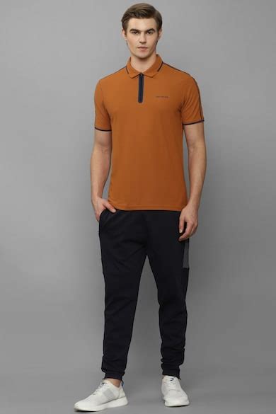 Buy Men Orange Solid Polo Neck T-shirt Online - 927976 | Louis Philippe