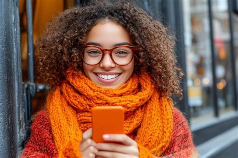 Young woman sitting in the city and use a mobile phone | Premium AI ...