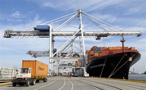Crane Operators Move Shipping Containers - Get a Shipping Container For Sale or Rent @ Shipped.com