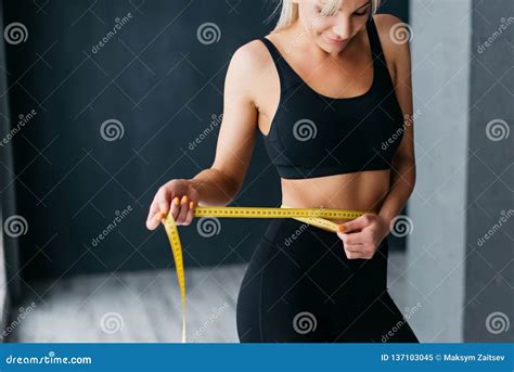 Athletic Slim Woman Measuring Her Waist by Measure Tape Stock Image ...