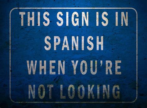 Download This Sign Is In Spanish When You're Not Looking Wallpaper ...