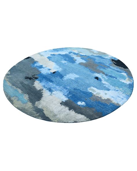 The Blue Round Rug: Serenity in Cocoon Fine Rugs Collection